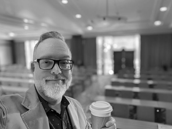 Bryan Chaney cheers ahead of a speaking engagement.