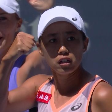 Tennis player showing a fist pump during a match.