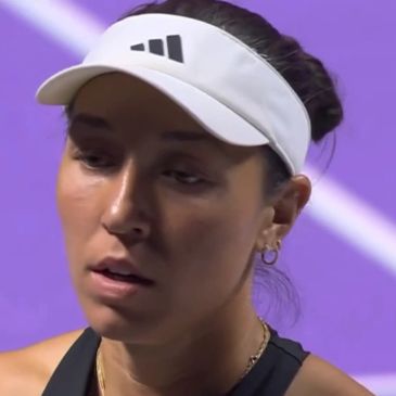 Tennis player with a focused expression.