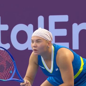 Tennis player focused during a match.