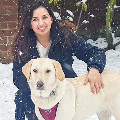 Photo of Suneeta, owner of Oceanic Counselling with her Pets As Therapy dog Bella