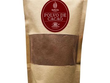 Package of natural cocoa powder labeled 'Polvo de Cacao'.