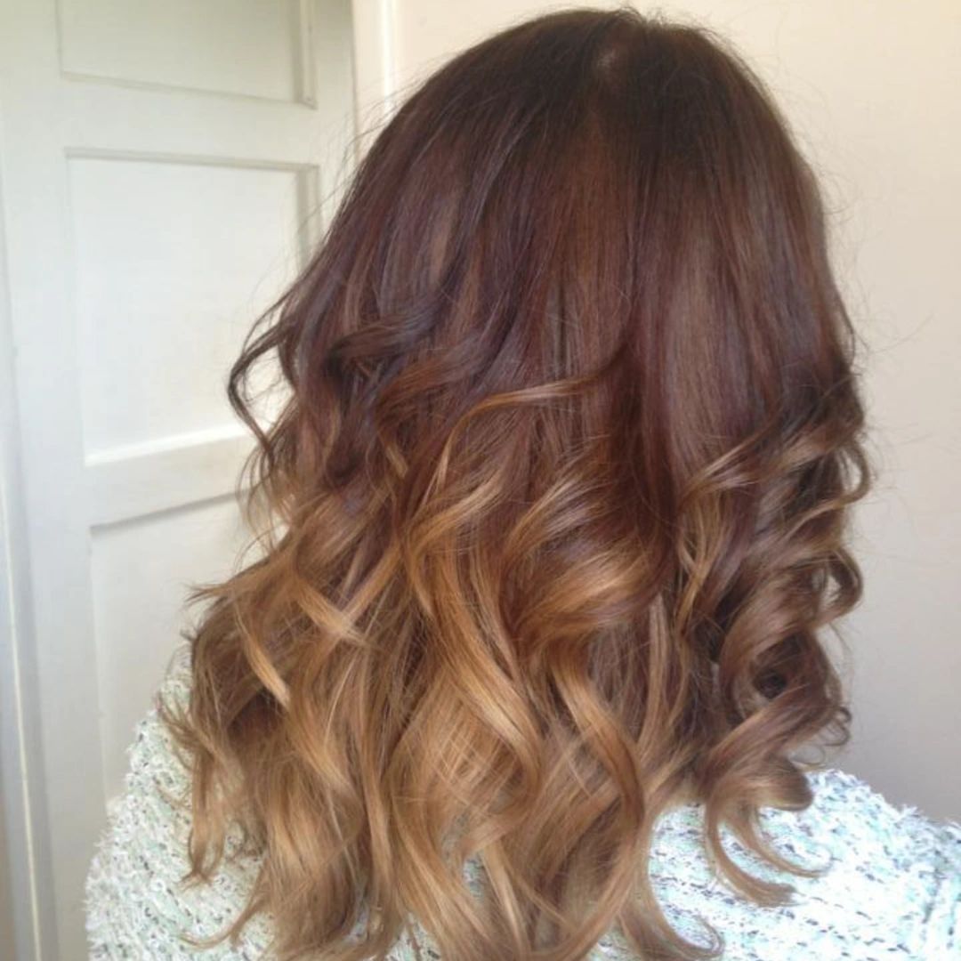 Caramel balayage with loose curls at Secret Escape hair salon near Royston