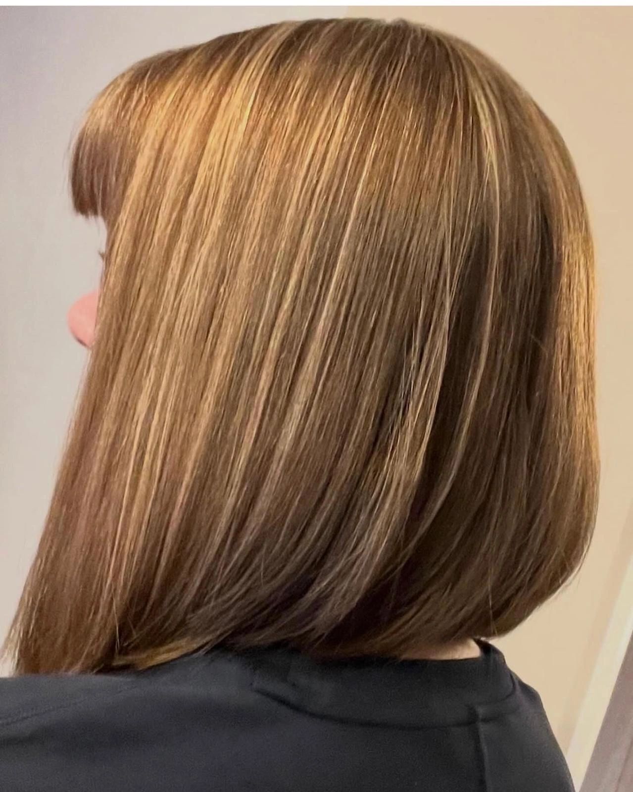 Highlighted blonde lob with a fringe at Secret Escape hair salon near Royston