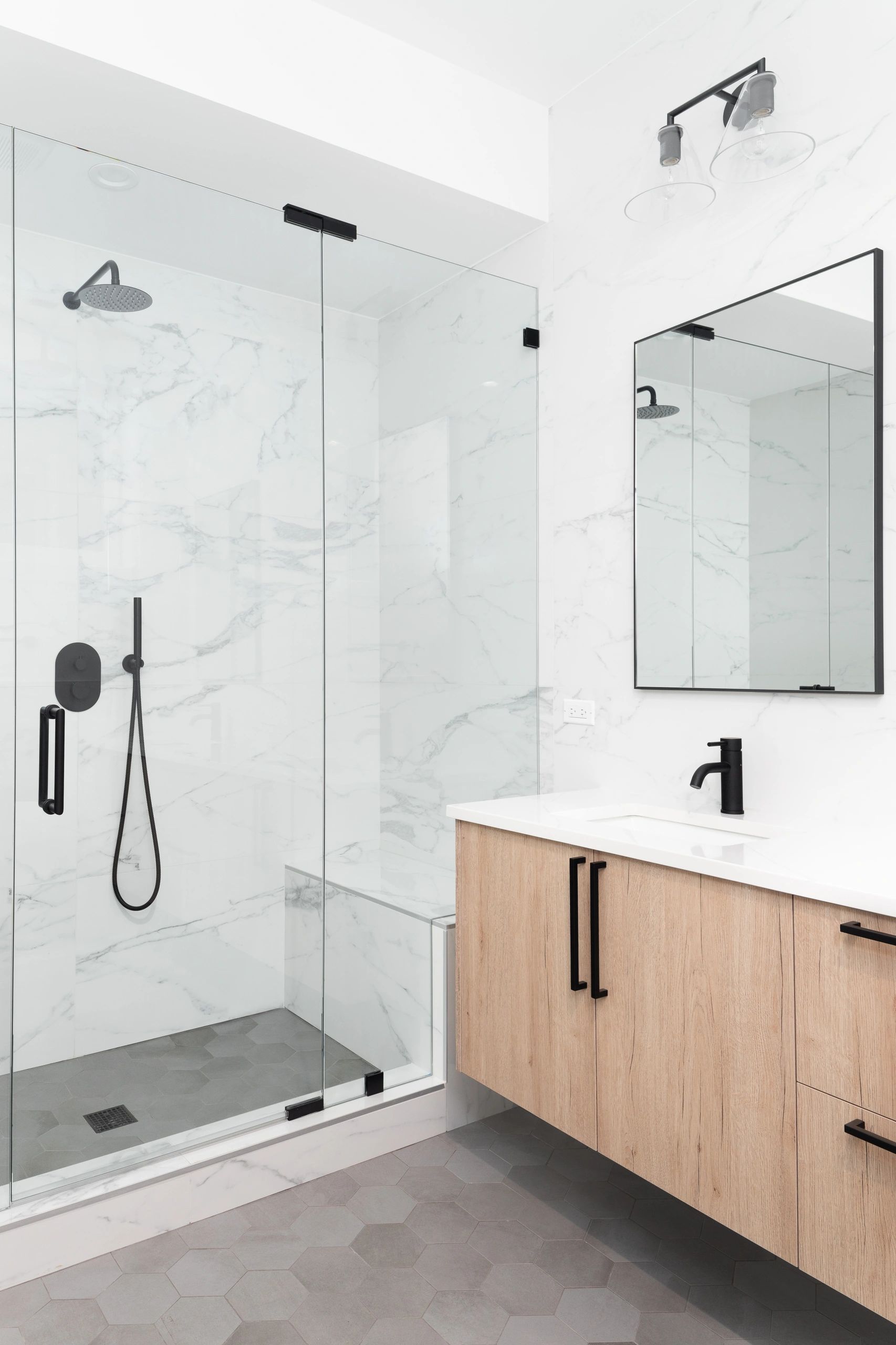white gray porcelain tile shower with gray hexagon floor tile