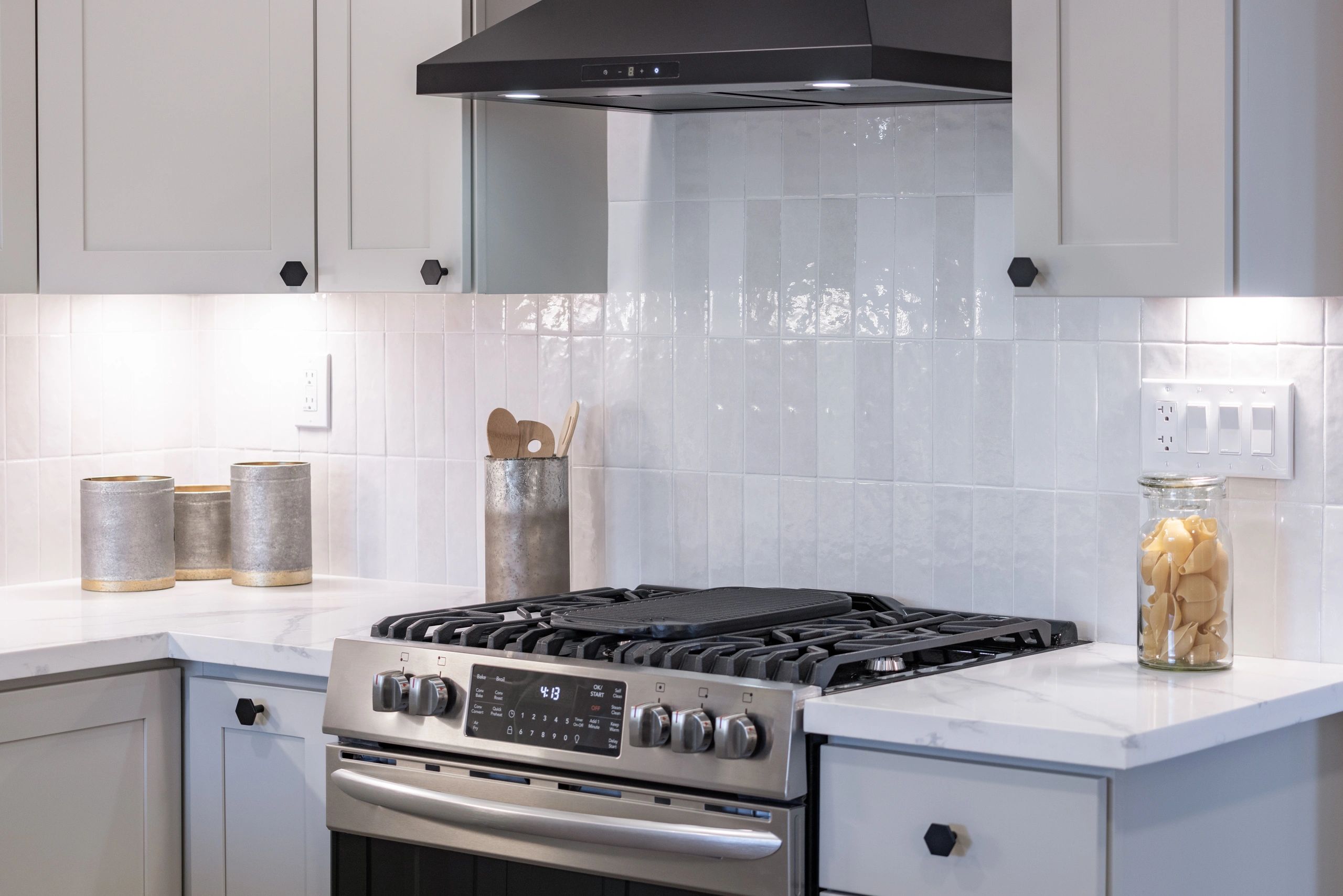 Gloss subway tile kitchen backsplash in soldier pattern