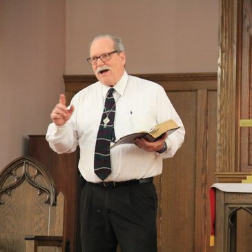 Pastor Harry Williamson delivers a sermon.