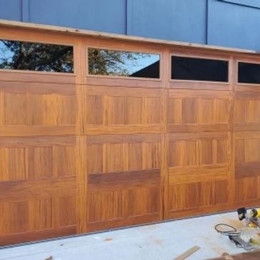 Custom wood finish garage door installation 