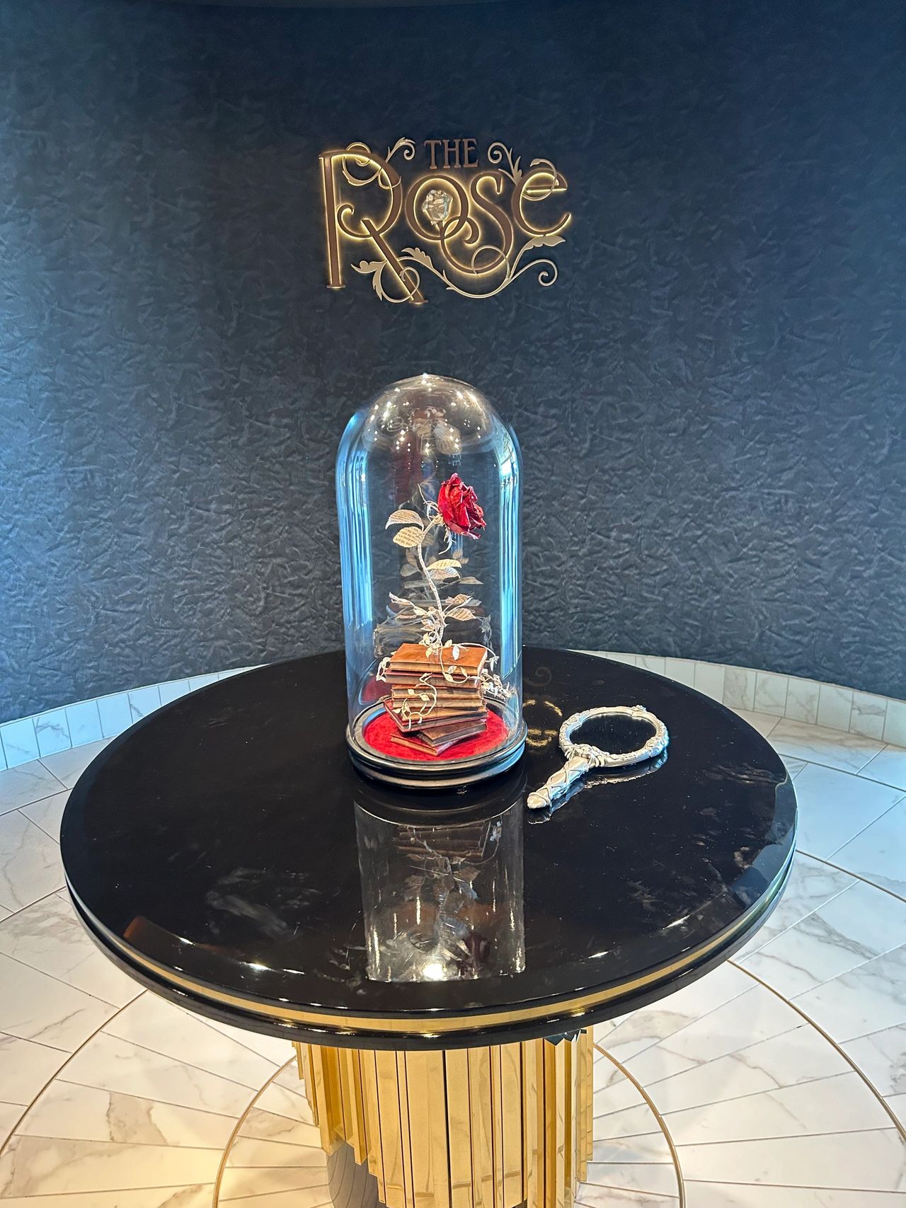 Guests visiting The Rose on the Disney Wish are greeted by this iconic scene from Disney’s Beauty and the Beast.