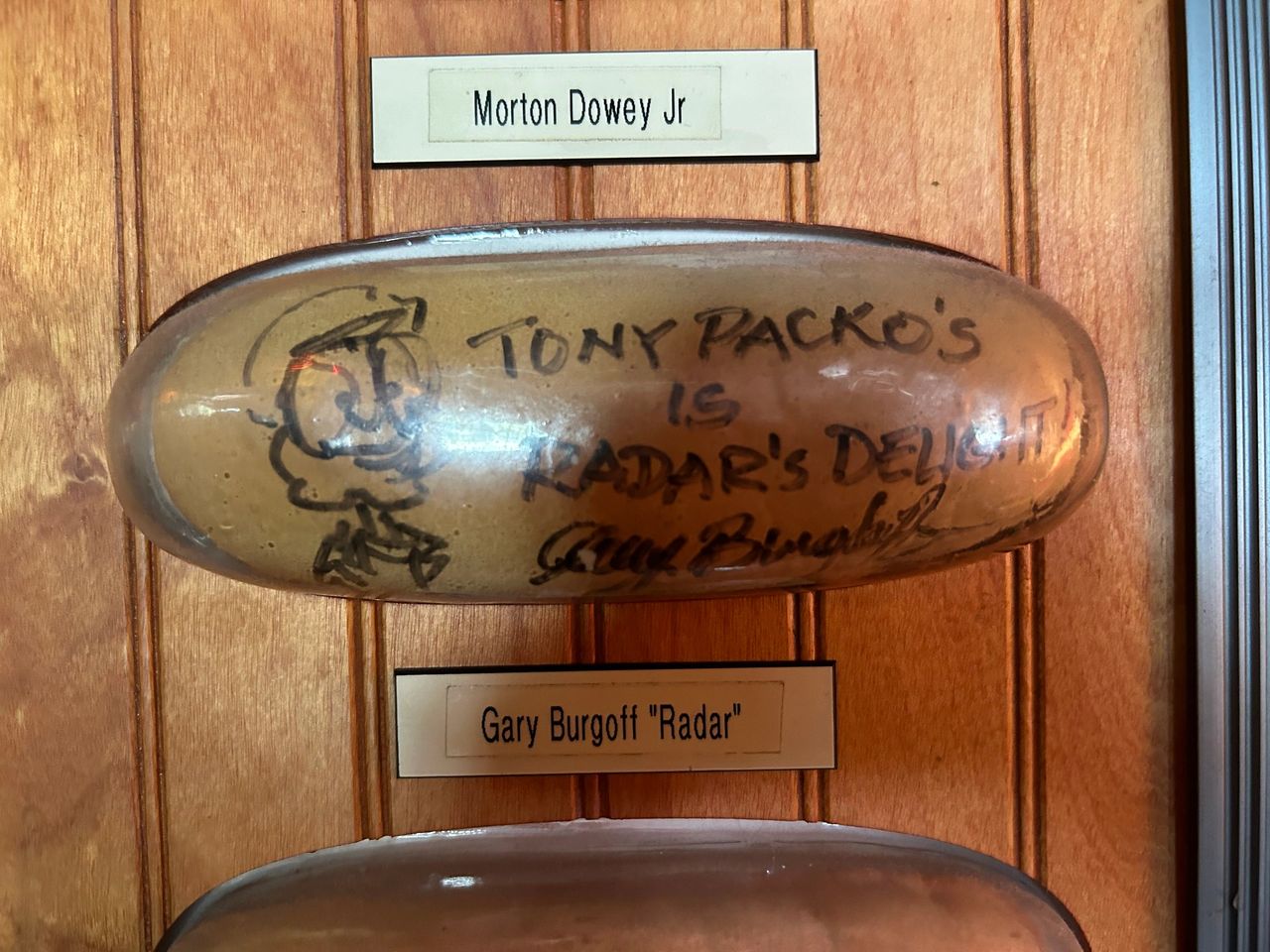 Signed hot dog buns line the wall throughout the restaurant at Tony Packo's in Toledo. They hold the World's Record for the largest collection of signed buns, which includes a who's who of celebrities including MASH star Gary Burghoff. Signed hot dog buns line the wall throughout the restaurant at Tony Packo's in Toledo. They hold the World's Record for the largest collection of signed buns, which includes a who's who of celebrities including MASH star Gary Burghoff.