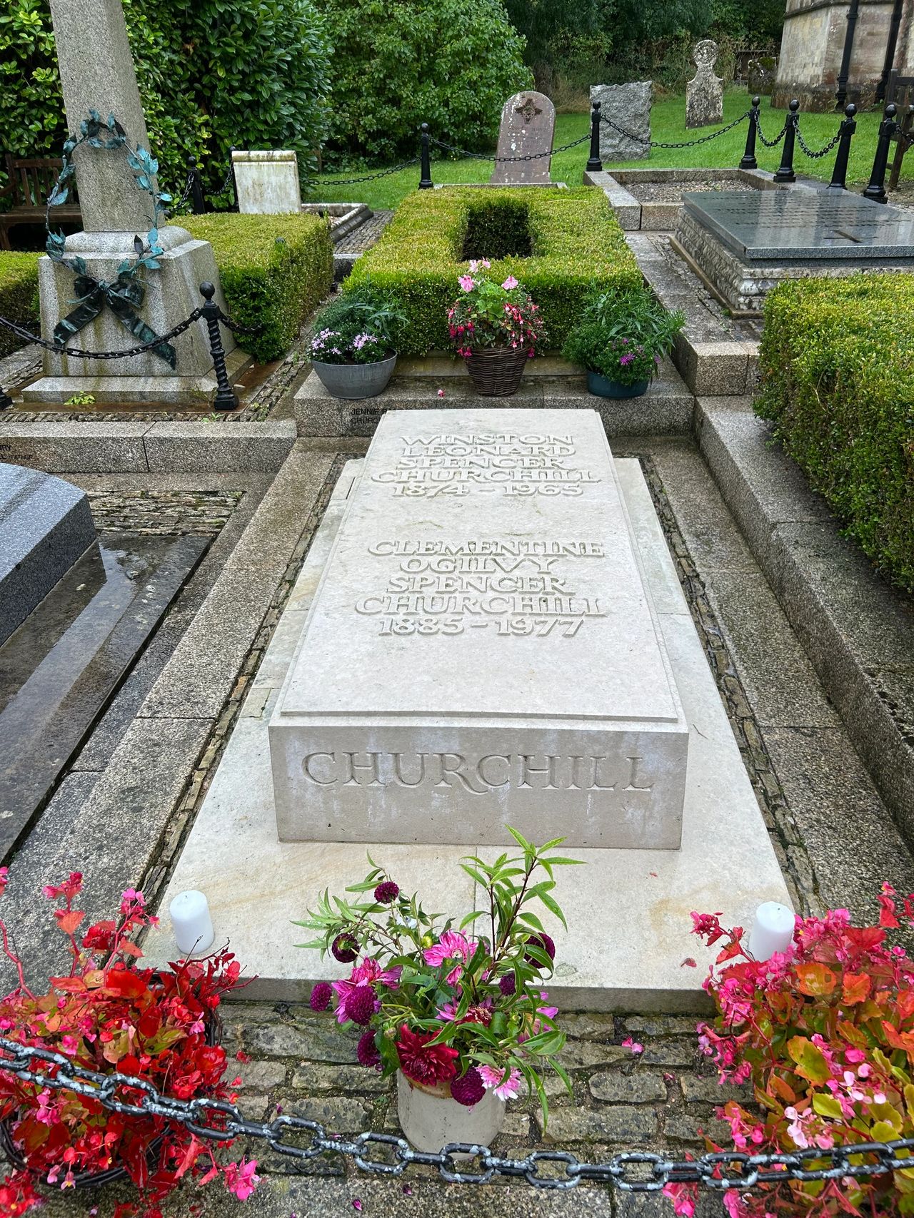 The grave of British leader Winston Churchill and his wife Clementine is located in Woodstock, UK. The grave is near Blenheim Palace, where Winston was born.