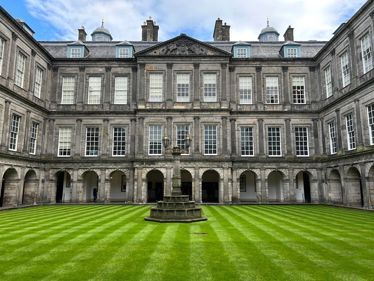 The courtyard at the Palace at Holyrood House in Edinburgh. A tour of Holyrood includes the amazing interior which is filled with history as well as the well maintained gardens outdoors.