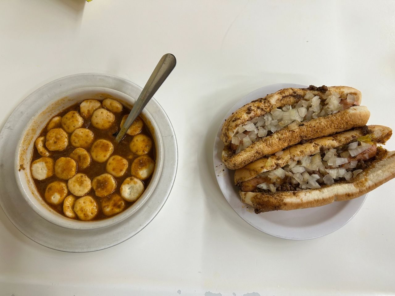 The perfect combo meal at Coney Island in Fort Wayne, a cup of chili and a pair of coney dogs with mustard. The exact meal has been their best seller at Coney Island for well over one hundred years.