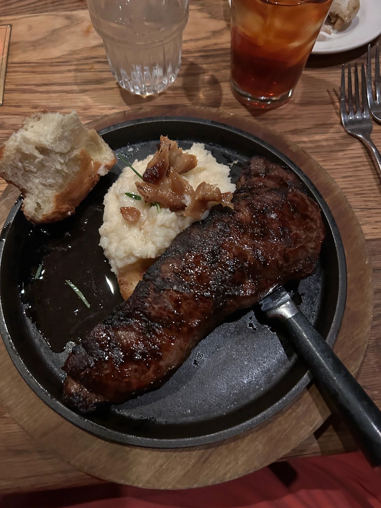 Come hungry at Tam O'Shanter because their big cuts of steak will fill you up. That includes the New York strip steak, 14 oz. and served with mashed potatoes and garlic confit. Come hungry at Tam O'Shanter because their big cuts of steak will fill you up. That includes the New York strip steak, 14 oz. and served with mashed potatoes and garlic confit.