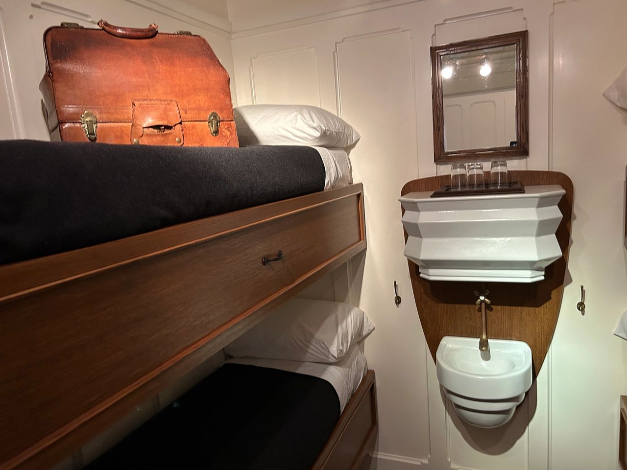 Two sets of bunk beds and a small sink with running water were the amenities of a third class cabin. This exhibit showed the actual space, which seemed cramped by today's standards, but were actually a new standard of comfort in 1914.