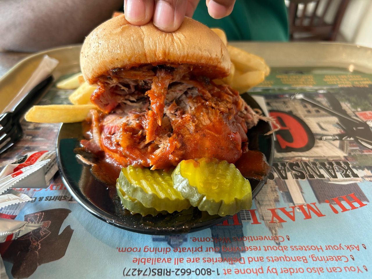 Pull pork sandwich with fries and pickles from Gates Bar-B-Q in Kansas City.