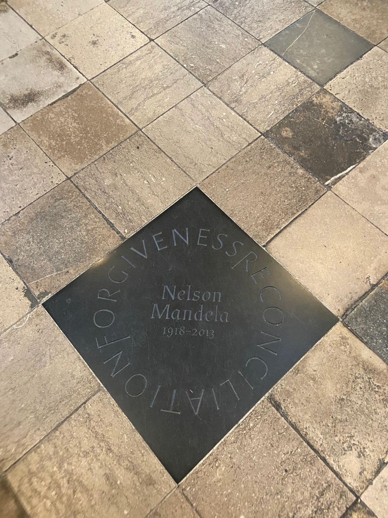 “Forgiveness Reconciliation” are the words engraved to symbolize the life of Nelson Mandela, memorialized at Westminster Abbey.