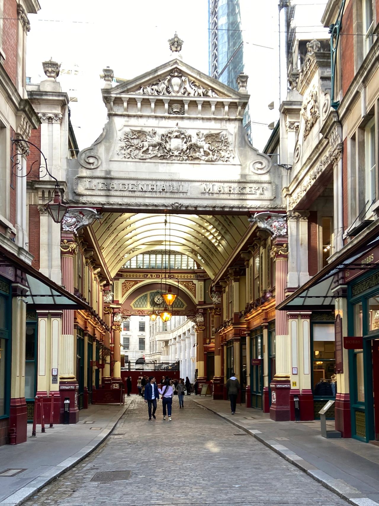 The historic Victorian architecture of Leadenhall Market, a real-life Harry Potter site in London that served as the inspiration and filming location for Diagon Alley.