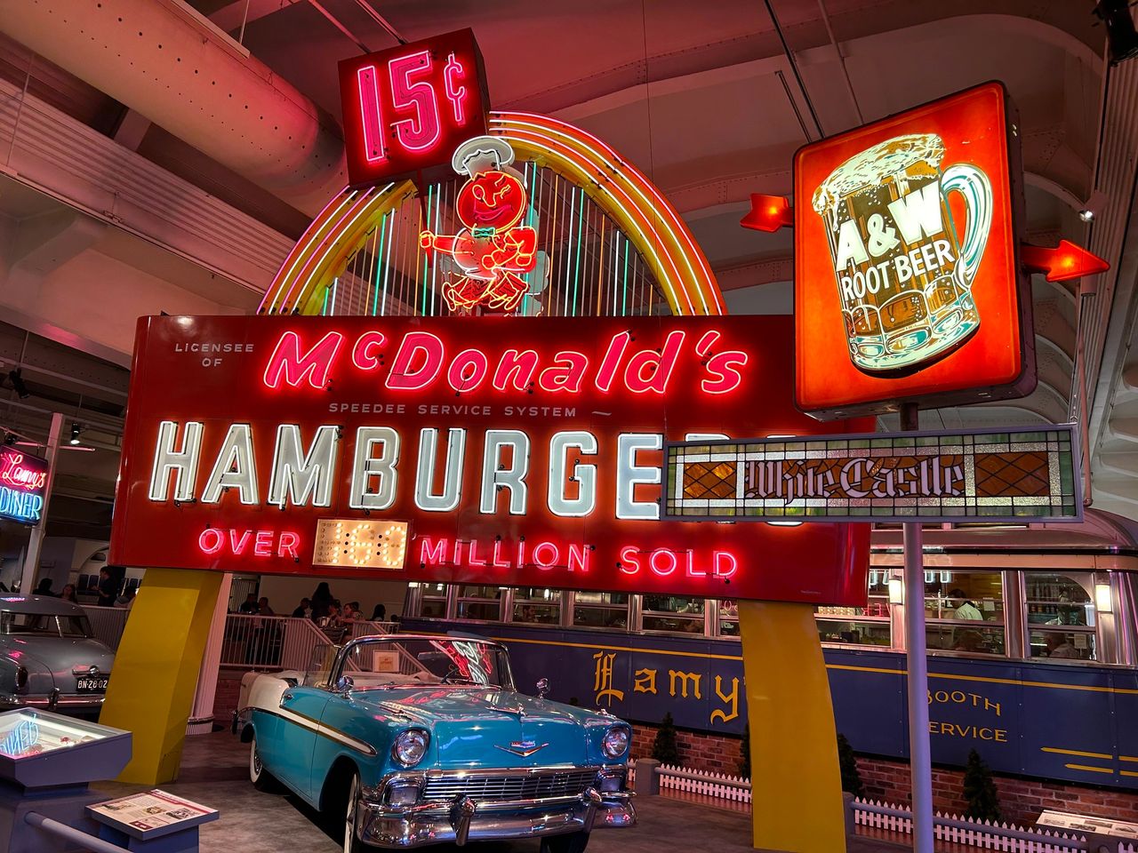 Take a walk down memory lane with vintage signage. The original McDonald's sign on display features a single arch.