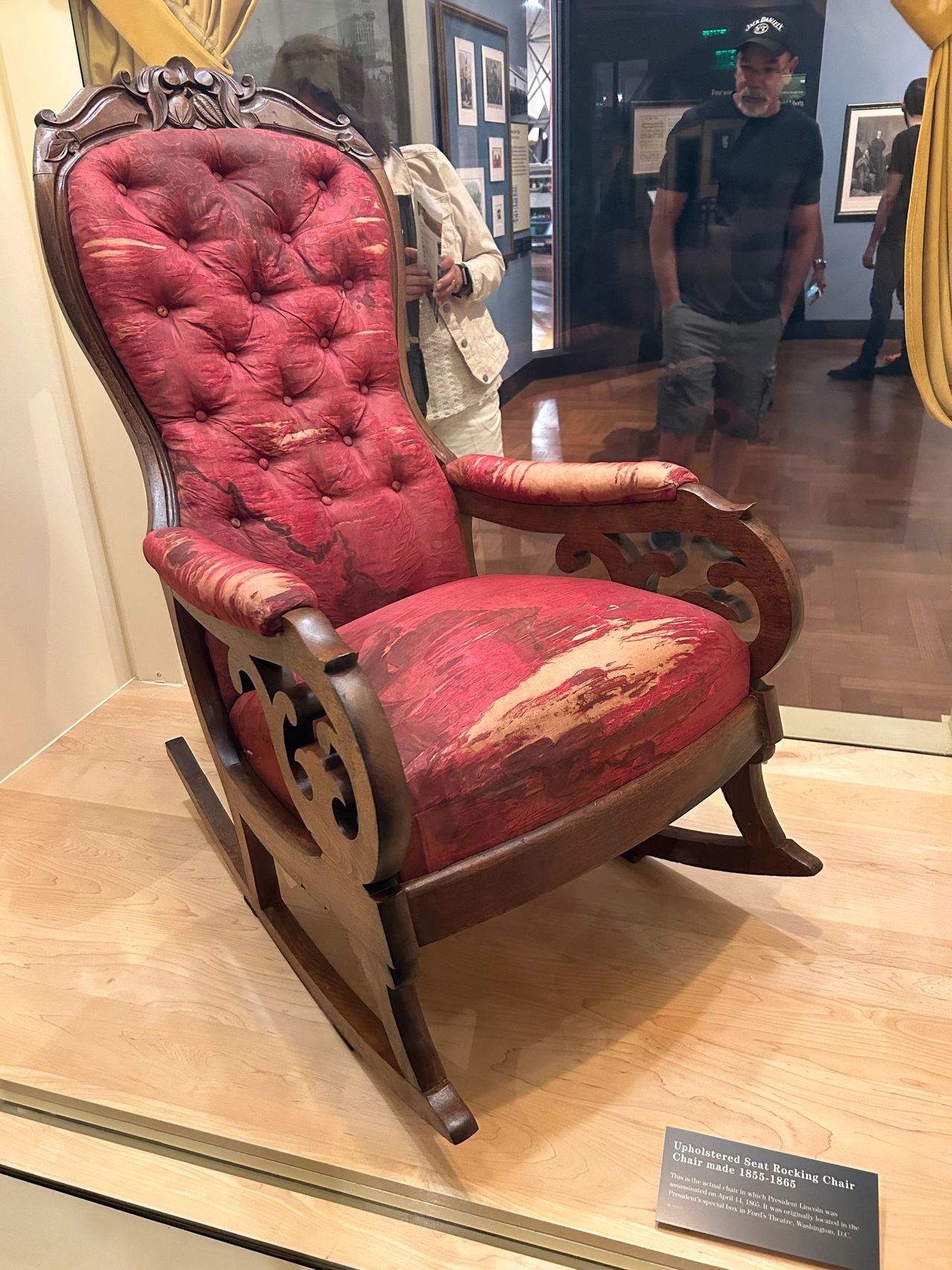 The actual chair that President Abraham Lincoln was seated in, watching a play at Ford's Theatre in Washington DC when John Wilkes Booth pulled the trigger. This is a part of a collection about Lincoln on display.