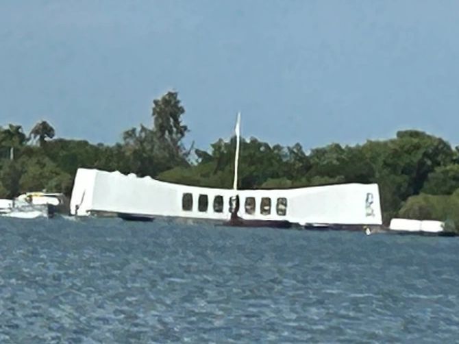 A view from shore of the USS Arizona Memorial at Pearl Harbor.