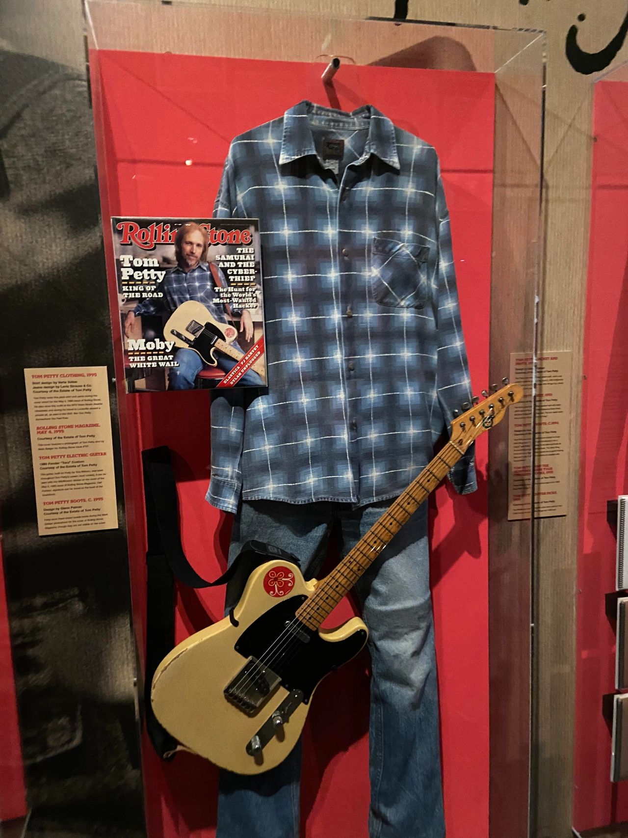 Tom Petty display at the Rock and Roll Hall of Fame. This features one of his guitars along with the outfit he wore for the cover of Rolling Stone magazine.