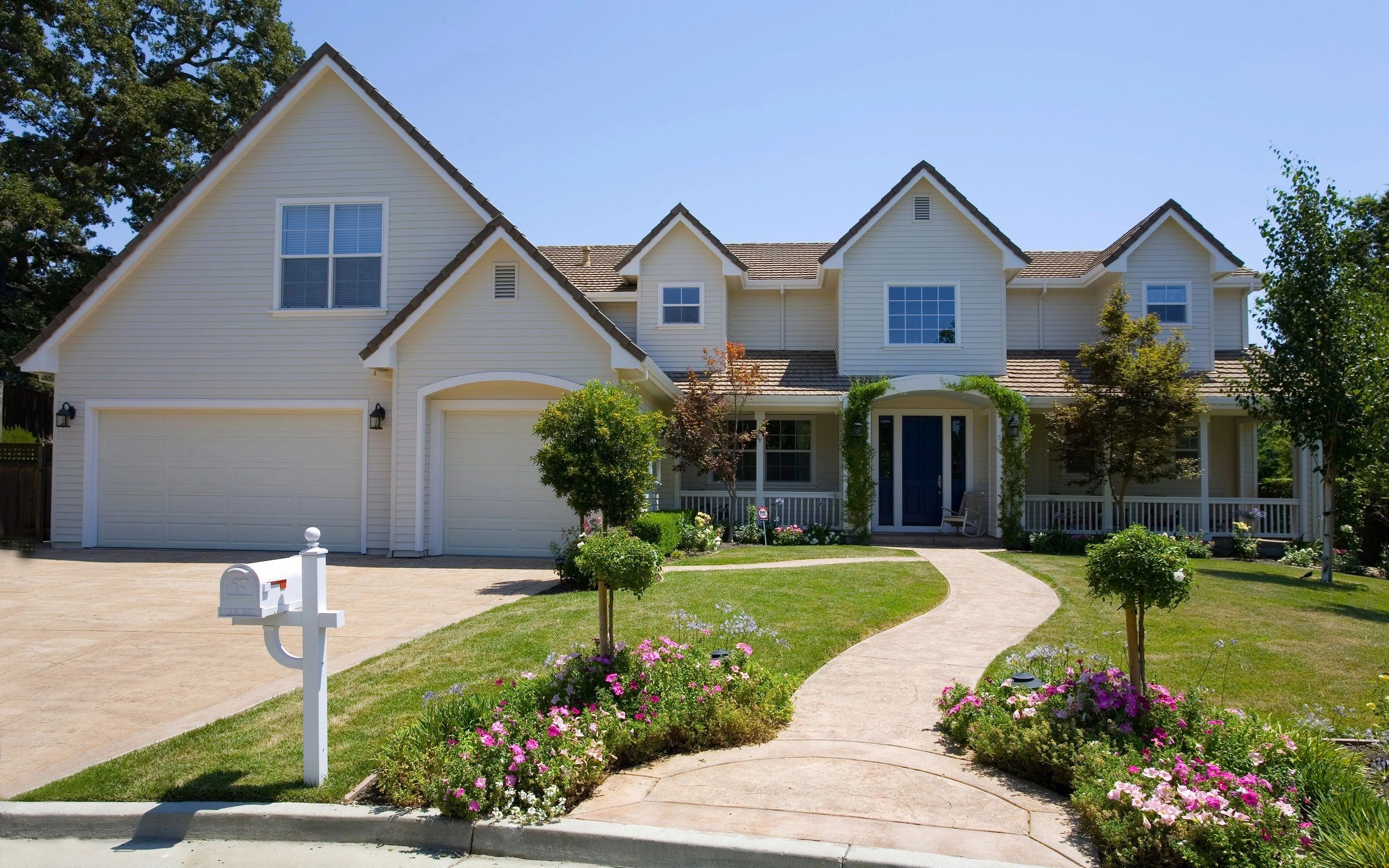 Cleaned home exterior.  House washed, roof cleaned, driveway cleaned.