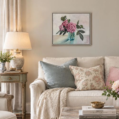 20 x 16 inch original oil painting of peonies in a vintage ball jar by Mary Lanka in a living room.