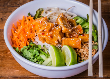 CRISP LETTUCE, COLD RICE NOODLES, CUCUMBER, BEAN SPROUTS, PICKLED CARROTS, CILANTRO, CHOPPED PEANUTS