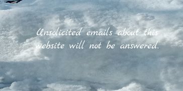 Snow-covered ground with a message about unsolicited emails.