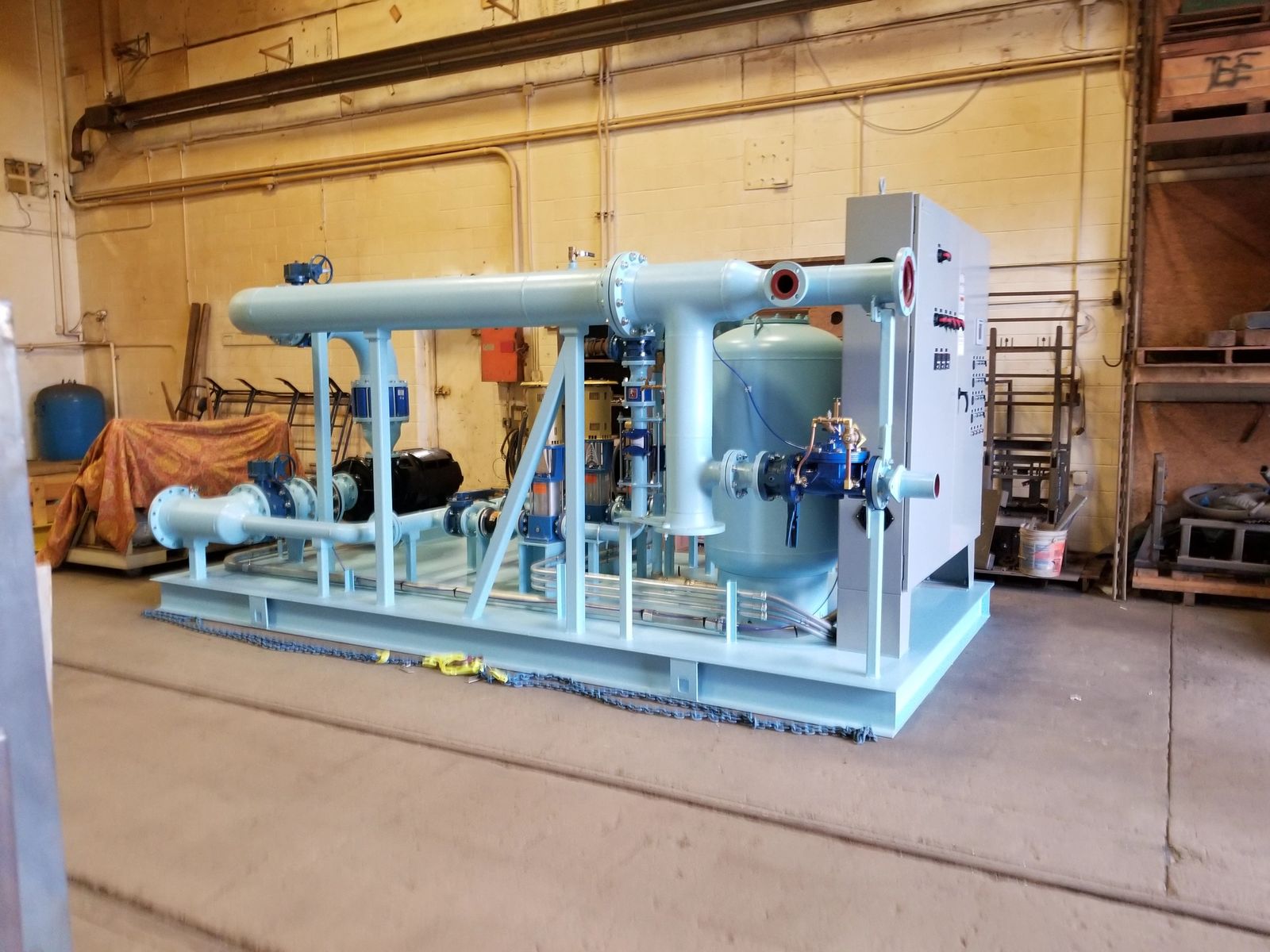 Skid mounted booster on flatbed