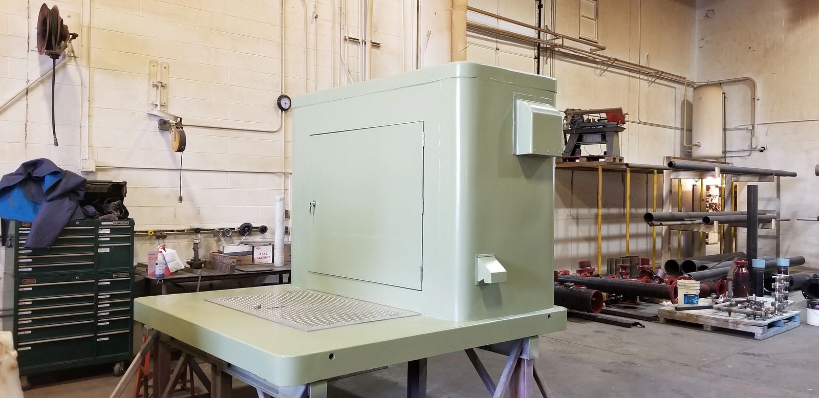 Submersible valve package housing