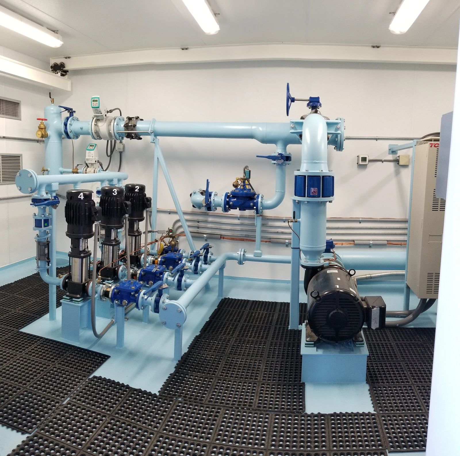 Modular water pumping system booster configuration