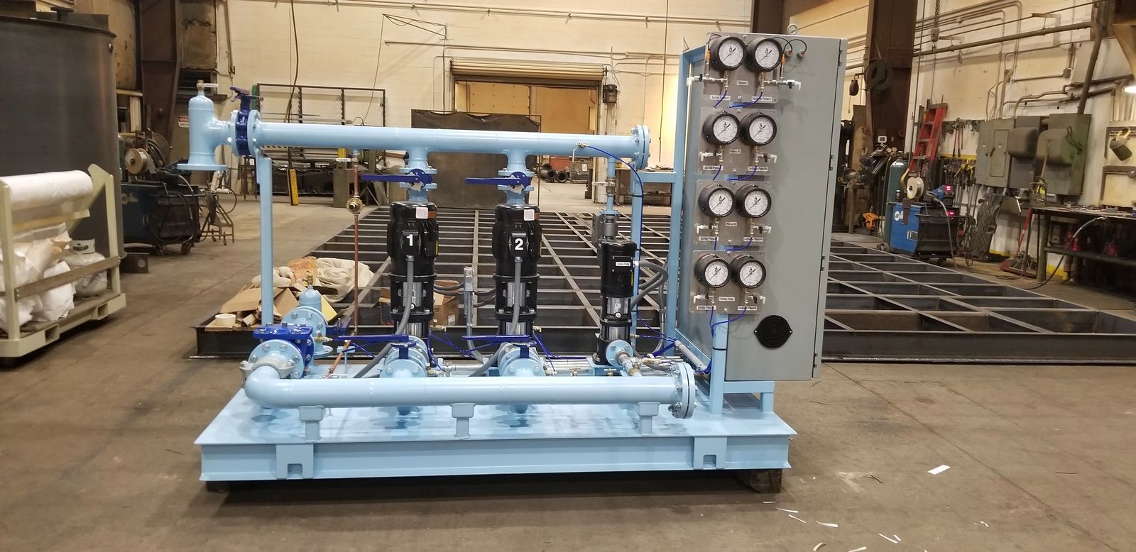 Skid booster package on shop floor