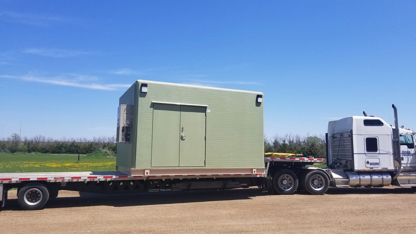 Above grade water booster on flatbed