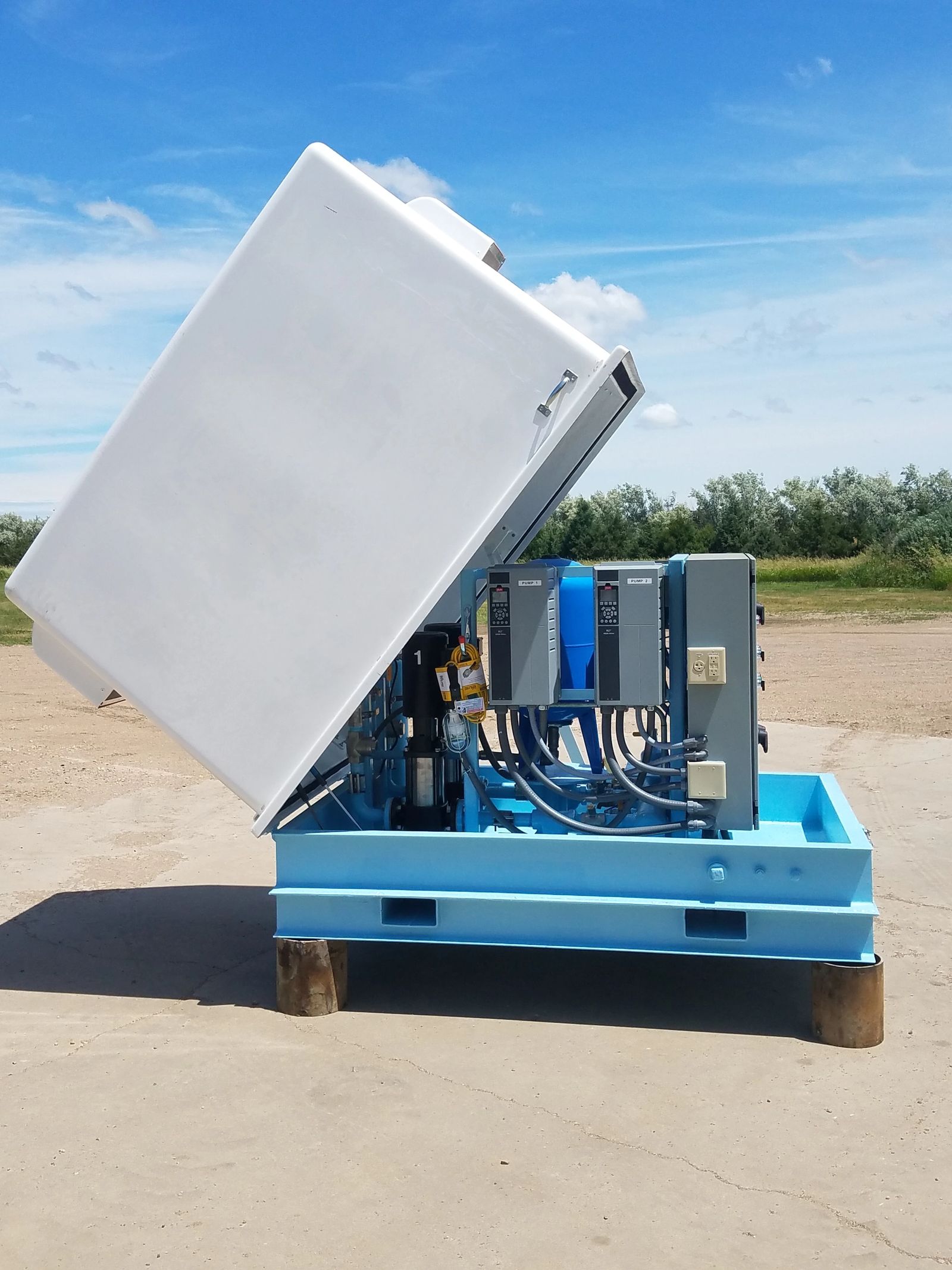 Above grade water booster hinged cover