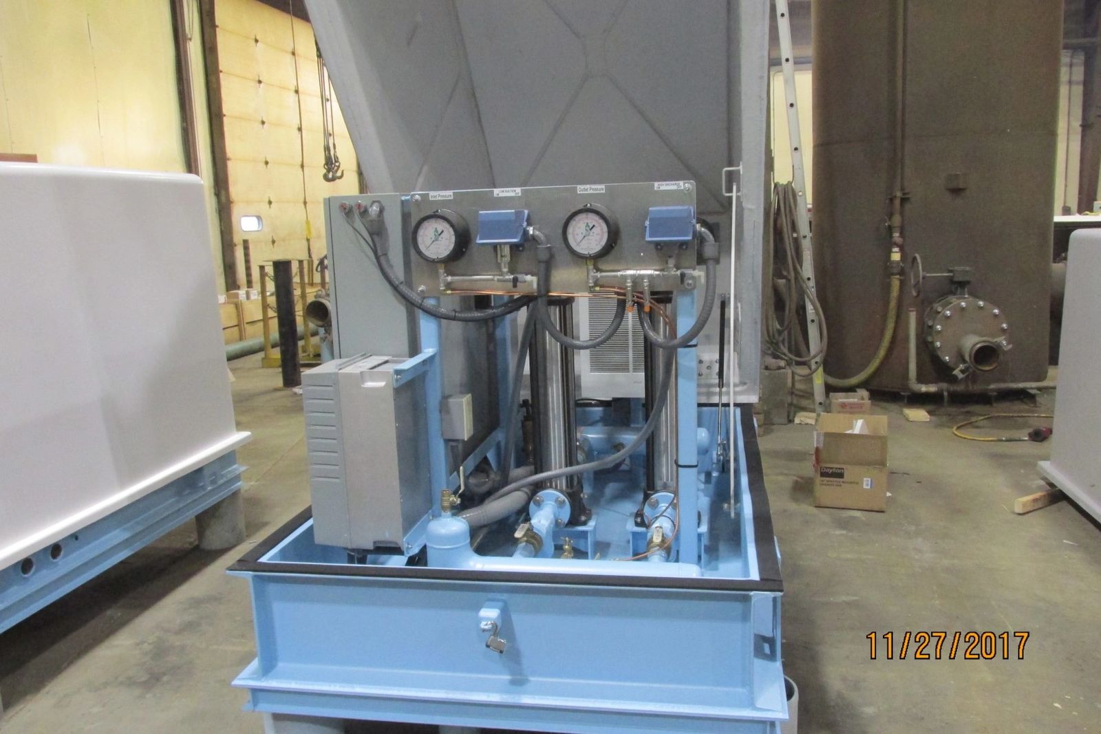 Grade mounted water booster interior components