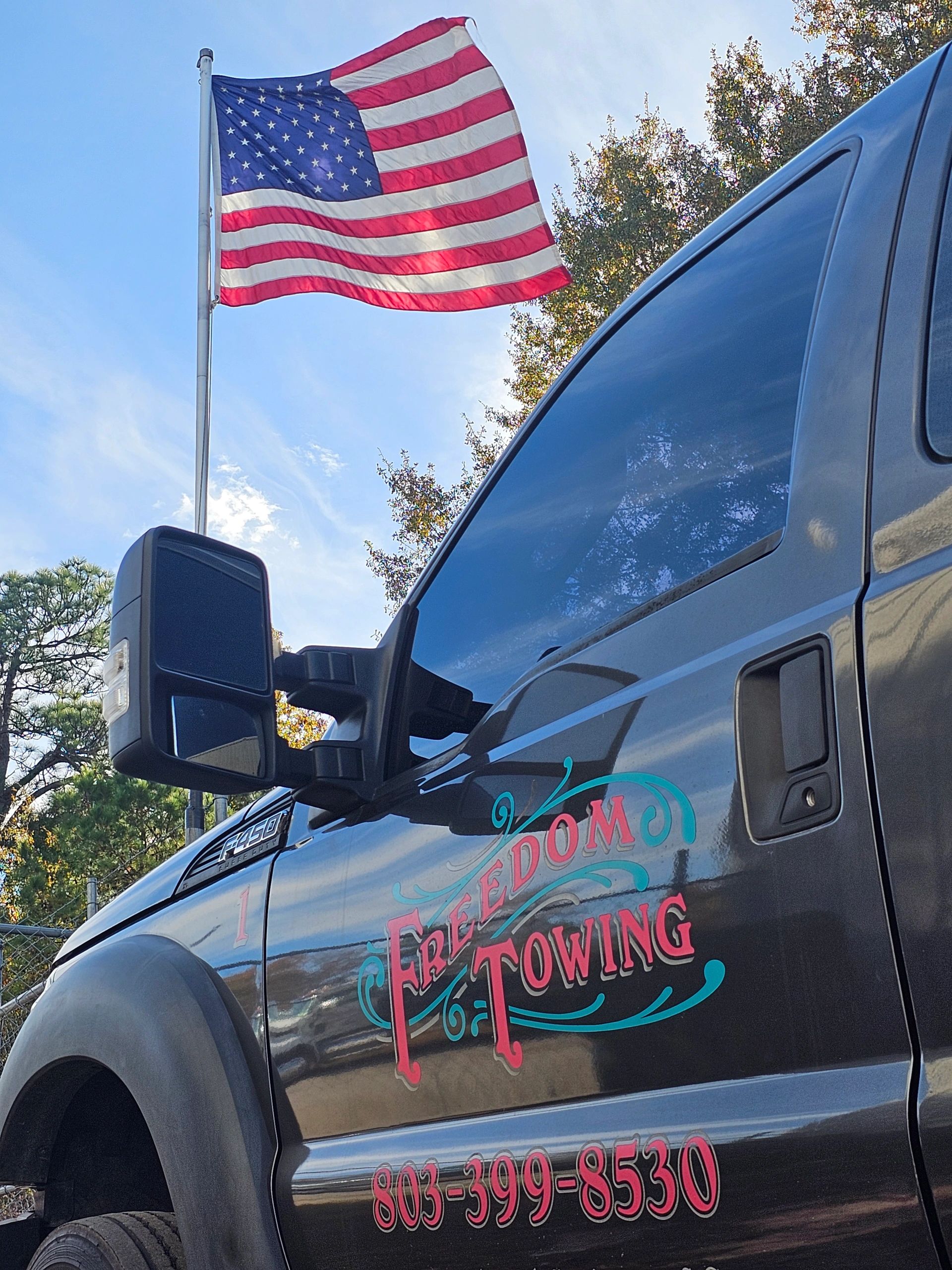 Freedom Towing & Recovery logo