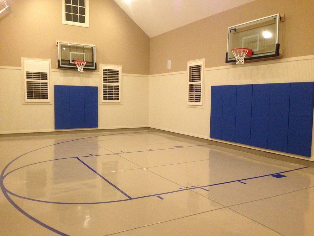 American Eagle Goals wall mounted basketball hoops, wall pads and painted game lines.