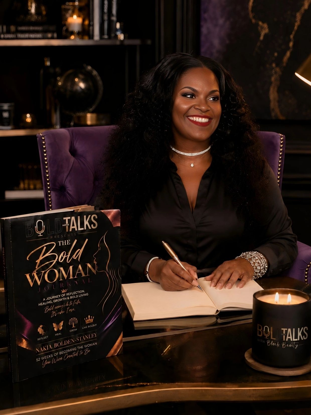 Woman smiling while writing in a journal.
