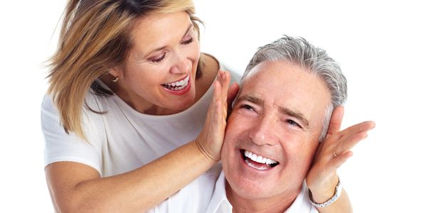 Happy middle-aged couple sharing a joyful moment together.