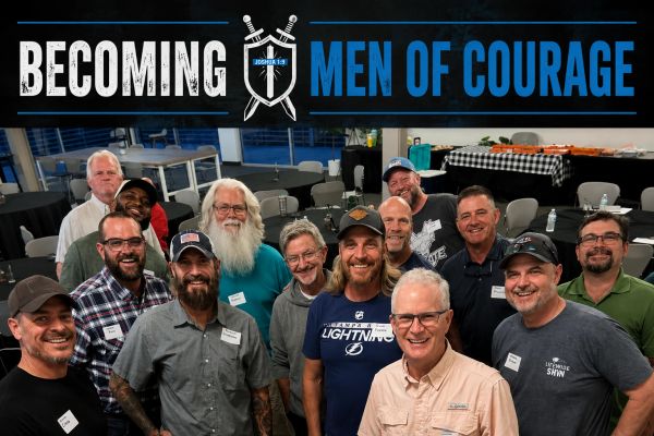 Group of men at a 'Becoming Men of Courage' event.