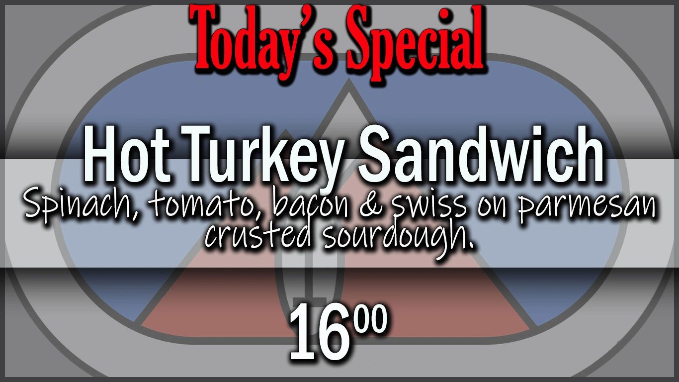 Today's special is a hot turkey sandwich with spinach, tomato, bacon, and swiss on parmesan sourdough.