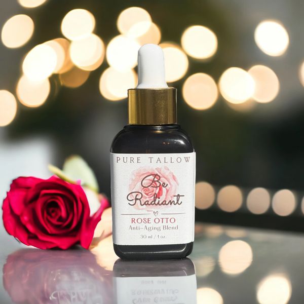 A Serum Bottle With A Red Rose Beside Image