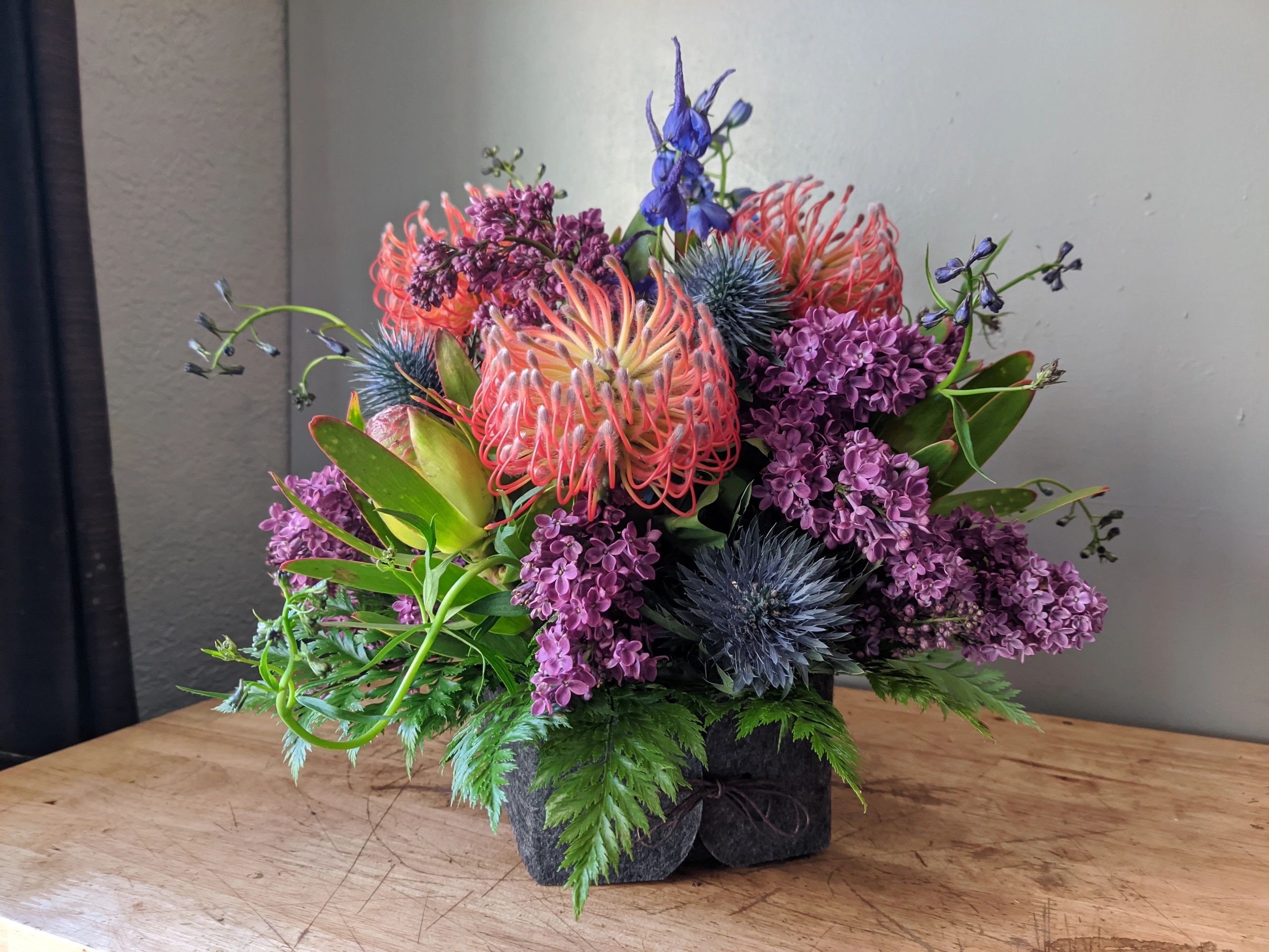 Iris's Garden, pin cushion protea, lilac, thistle, safari and fern