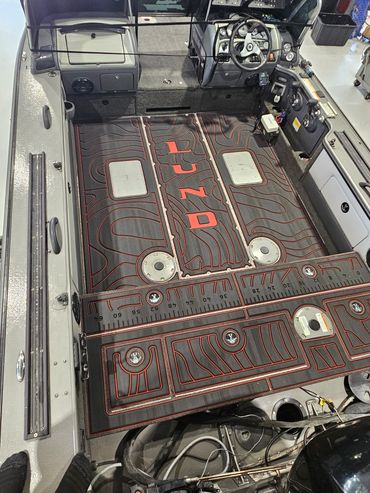 Interior of a Lund boat with custom flooring.
