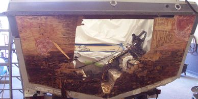 The outer skin has been taken off to remove all wood from transom to prepare for pouring Seacast™.