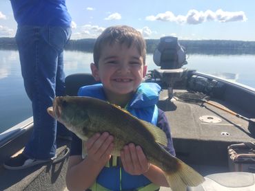 a boy with fish