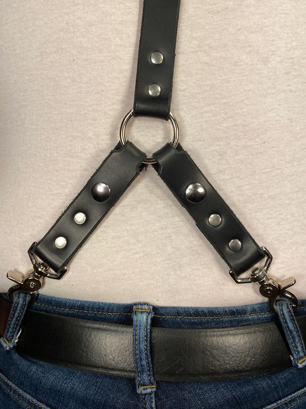 All suspenders come with a detachable extra strap for belt loops placed like this