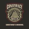 Logo of Conspiracy Coffee Co. with pyramid and eye design.